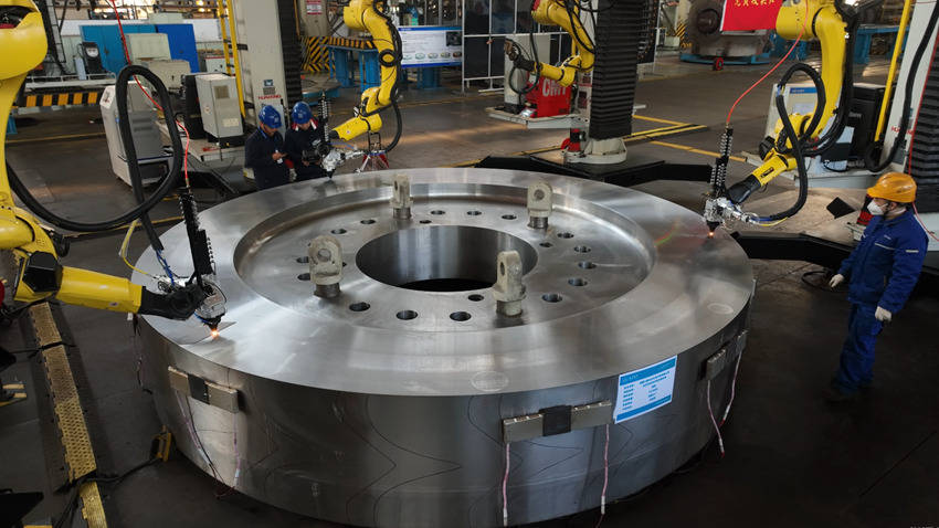 皇冠信用网额度如何开_行进中国 ｜ 看机器人“铁臂绣花”