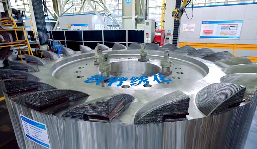 皇冠信用网额度如何开_行进中国 ｜ 看机器人“铁臂绣花”